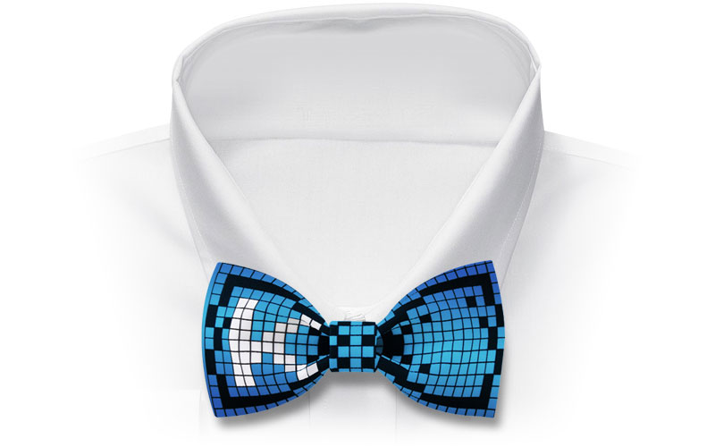 White dress shirt with a blue bakno themed bow